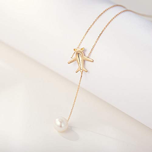 Collier en or rose 18 carats avec pendentif avion en nacre et diamant