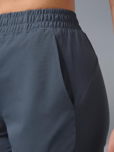 Image of TECHNOSPORT Women's Solid Straight Fit Track Pants with 4-Way Stretch, Moisture-Wicking Fabric, Mid-Rise Drawstring Waist & Pockets for Gym, Running, Workout and Everyday Athleisure