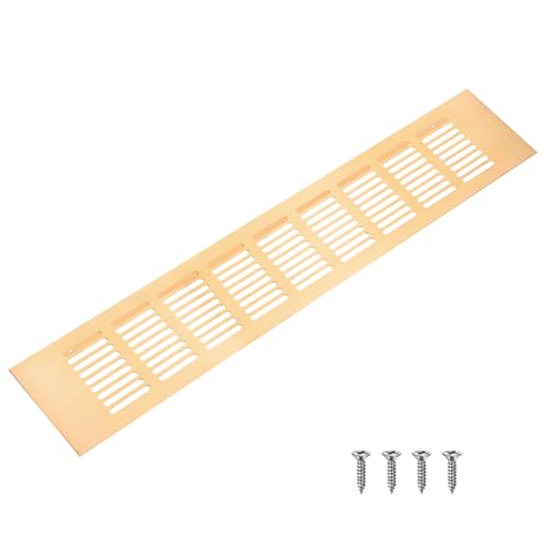 Grille d'aération or brossé pour harmoniser la ventilation de la cuisine