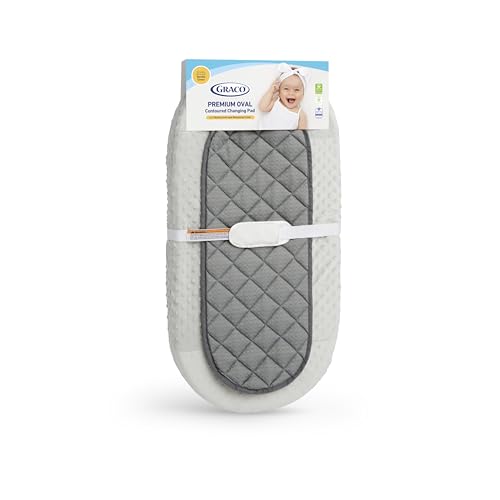 Image of Graco Premium Oval Contoured Changing Pad with Bonus Cover and Water-Resistant Liner – GREENGUARD Gold Certified, Cocoon-Like Oval Contoured Shape, Fits All Standard Changing Toppers, Ultra-Soft Cover