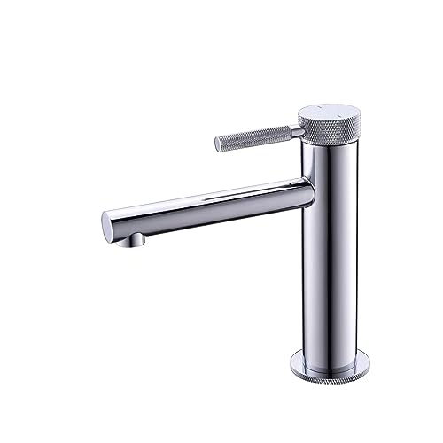 Robinet de vasque or rose pour une salle de bain rétro et chaleureuse