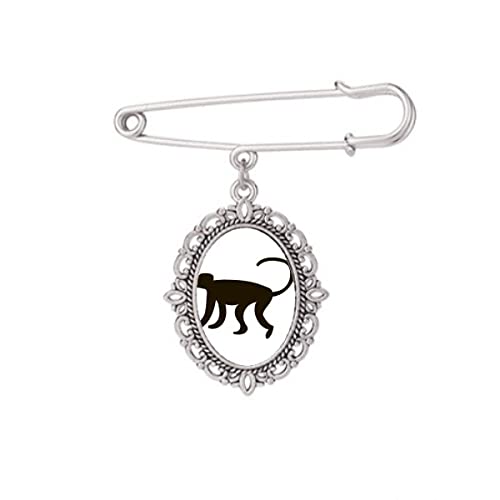Broche noire singe M accessoire idéal pour une robe de soirée chic