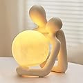 AWNR Ceramic Couple Statue Hold The Lamp Figurines with USB Ports (with 3 Color Light) Abstract Art Sculpture for Home Decor Living Room Bedroom Nightstand Decorations Gift for Anniversary