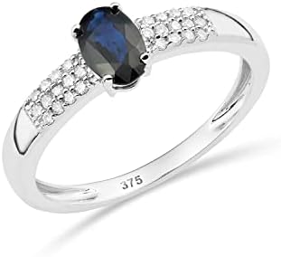 Miore anillo de compromiso con pavé de diamantes y zafiro en oro blanco de 9 quilates 375 con 26 diamantes naturales talla brillante 0,10 quilates y zafiro azul oval natural 0,55 quilates.