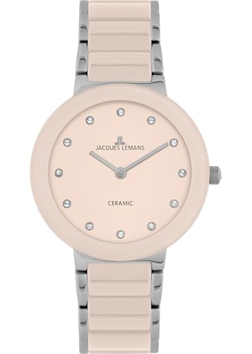 Fondo avvitato in acciaio inox. Display: ora e minuti centrali color argento, senza lancetta dei secondi, quadrante rosa con zirconi scintillanti come indici delle ore