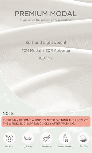 Image of ODODOS Soft Modal Long Sleeve Crop Top for Women with Thumb Hole Athletic Gym Workout Cropped Yoga Shirts