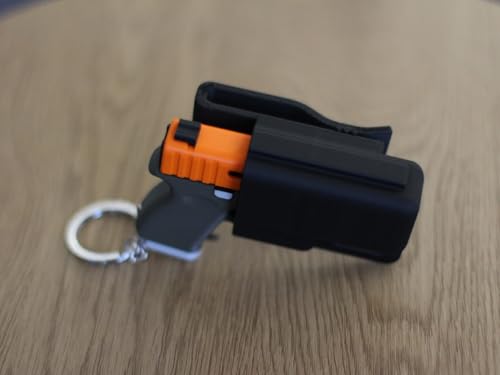 Image of Gun Shape Keychain for Men, Stylish Pistol Design Key Ring, Durable Plastic Key Holder for Car, Bike & Bags, Cool Trendy Keychain