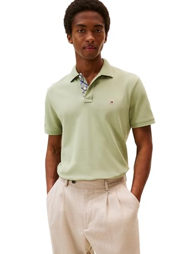 Camisetas polo casuales para hombre de Tommy Hilfiger, manga corta, corte regular con estiramiento y diseño de plastrón oculto miniatura 1