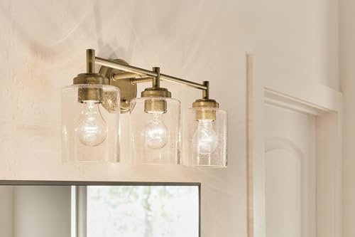 Image of Kichler Winslow 21.5 inch 3-Light Bathroom Vanity Light Fixture with Clear Seeded Glass in Natural Brass for Luxe Industrial Style Over Mirror (21.5 inch x 9.25 inch), 45886NBR