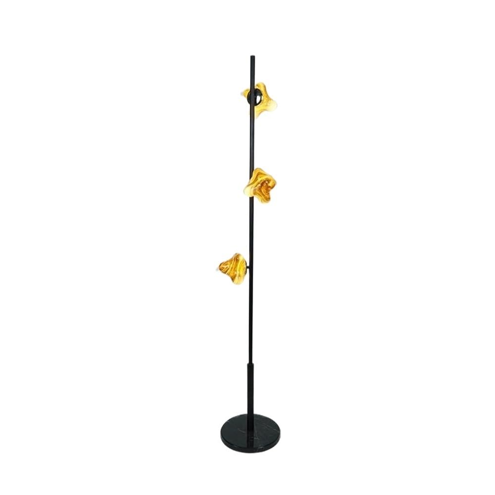Lighting Golden Glass Floor Lamp Beside The Sofa in Living Room