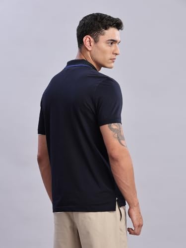 Image of Tommy Hilfiger Mens Blue Solid Polo Shirt