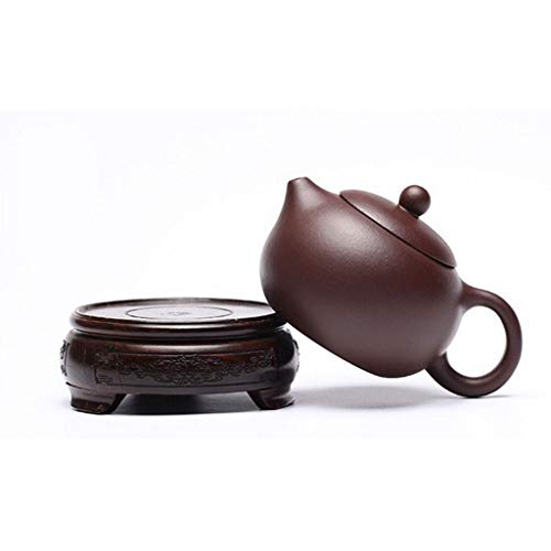 Tetera de cerámica marrón con filtro artesanal que evita hojas sueltas en tu té 6