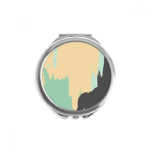 Miroir rond maquillage portable jaune abstrait dans votre sac de voyage