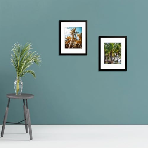 Image of Frametory, 11x14 Picture Frame - Display 8x10 Photo with Mat - Wide Molding - Preinstalled Wall Mounting Hardware (Black, 8-Pack)