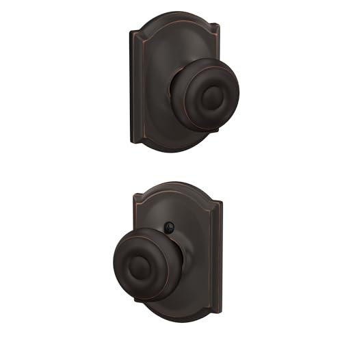 Image of Schlage F10 GEO 716 CAM Georgian Door Knob with Camelot Trim, Hall & Closet Passage Lock, Aged Bronze