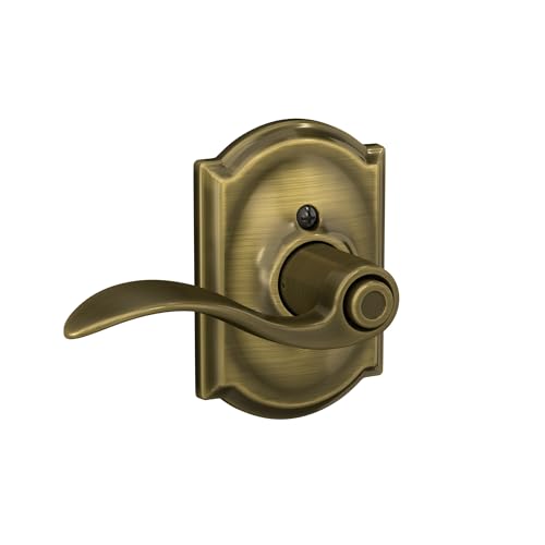 Image of Schlage Accent Lever with Camelot Trim Bed and Bath Lock in Antique Brass - F40 ACC 609 CAM