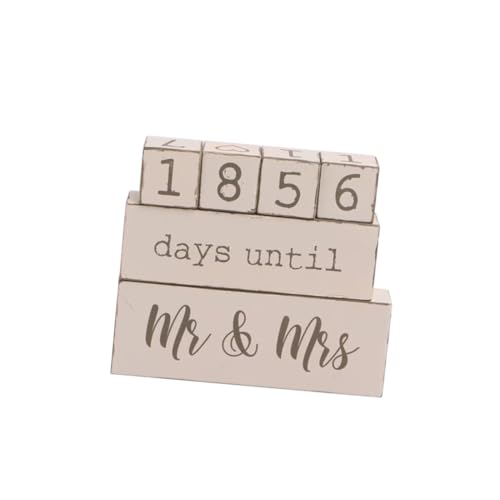 Changement manuel de date avec ce calendrier en bois pour ne plus oublier le jour J