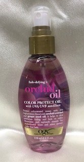 OGX FADE-DEFYING + ORCHID OIL. COLOR PROTECT OIL WITH UVA/UVB SUN-LIFTERS. 4 FL OZ.