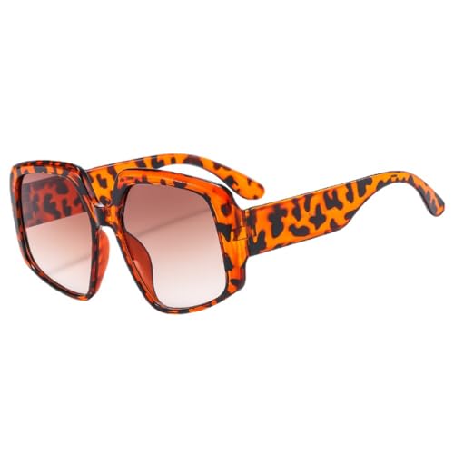 Lunettes de soleil vintage oversize pour femme avec une monture large noire style chic