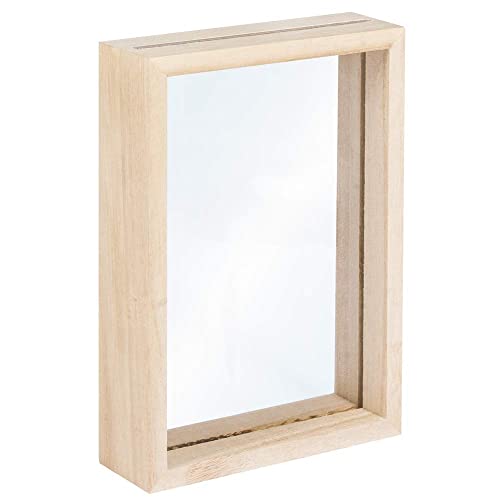 Sulla parte superiore della cornice c'è una fessura nel mezzo dove le due lastre di vetro vengono inserite dopo la decorazione