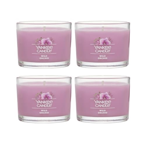 Image of Yankee Candle Mini Jar, Wild Orchid Floral Fragrance, Decorative Votive Candle Set for Gifting and Ambience, Clean Burning Natural Fiber Wick, 1.3 Ounce (Pack of 4)