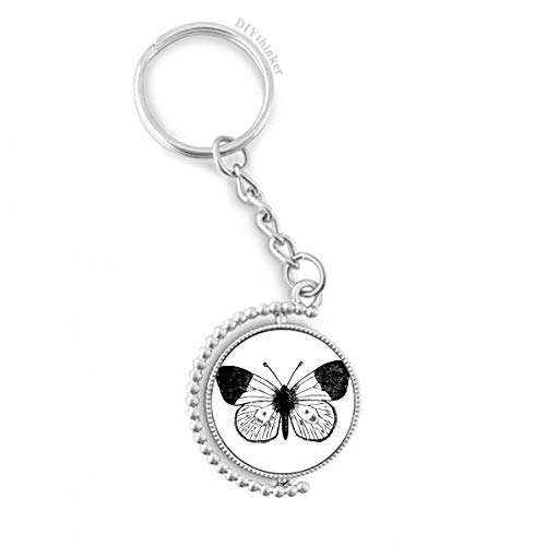 Porte-clés ailes de papillon blanc pour ne plus perdre vos clés