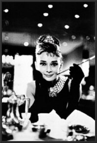 audrey hepburn breakfast at tiffany's cigarette hi-res stock photography and images This captivating print Audrey Hepburn as Holly Golightly