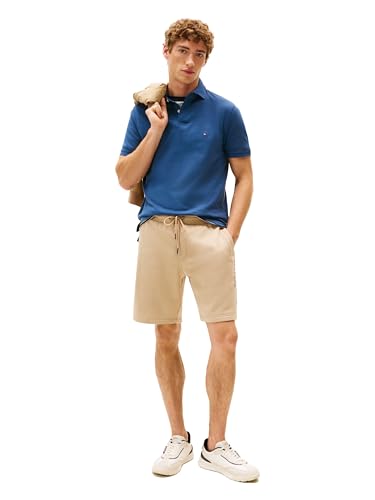 Image of Tommy Hilfiger Men's Short Sleeve Polo Shirts in Regular Fit With Stretch and Organic Pique Cotton