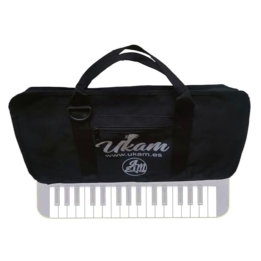 Funda UKAM sin acolchar con bolso para mini-teclados 32 notas,Compatible con: Casio SA46/SA47,SA-50/SA-51, OQAN QKB32 y KURZWEIL KP10. Fabricado en España, Medidas: 47x25x7cm, (Sin bandolera)