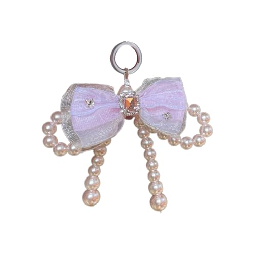 Charme de sac délicat avec perles et nœud papillon à la finition joaillerie fine