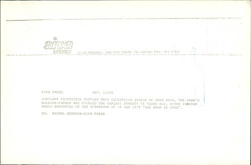 Vintage photo of Protesters tear down the statue