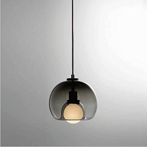 Plafond de pendentif en verre rond créant une ambiance de restaurant