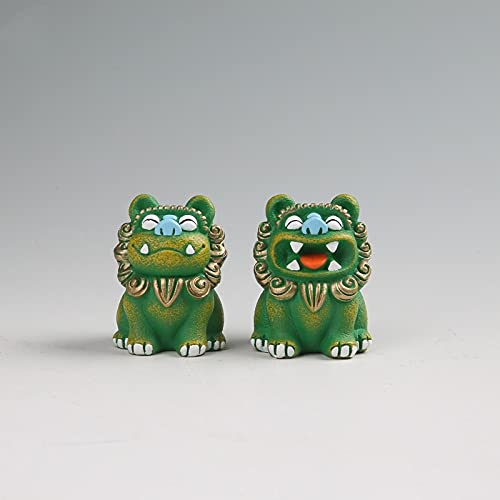 Statue de lion pour bureau vide solution déco verte et colorée en résine