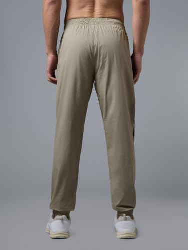 Image of TECHNOSPORT Men's Regular Fit Joggers with Zip Pockets, TECHNOLITE Quick Dry Stretchable Lightweight Track Pants for Gym Running and Casual Wear