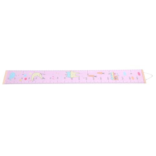 Regla para medir la altura de los niños en pared rosa sin marcas ni manchas