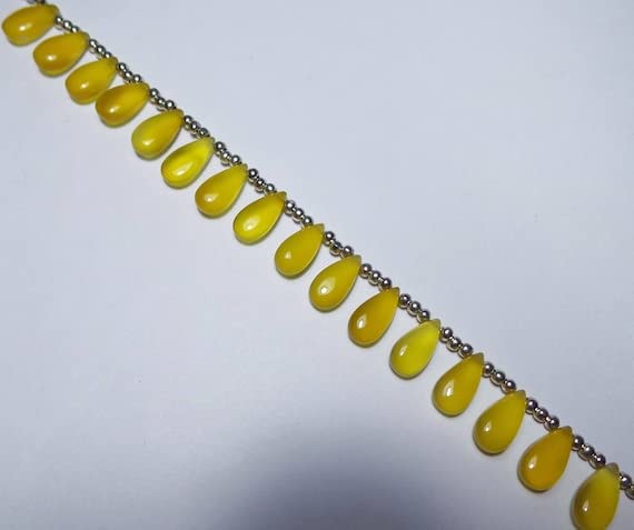 Calcédoine jaune briolette 15x7mm en paires assorties pour joaillerie fine