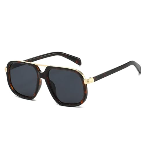 Lunettes de soleil au design soigné avec finitions rétro pour hommes et femmes