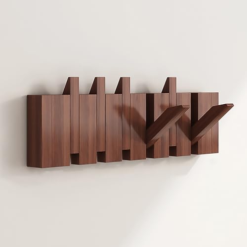3. Forte ed elegante: l'appendiabiti scultoreo funge anche da opera d'arte con ganci ribaltabili che possono contenere fino a 10 kg ciascuno.