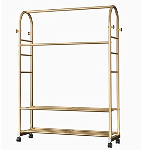 Présentoir à vêtements doré sur roulettes avec double support à chaussures en métal