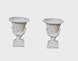 Dimensioni: Altezza 42,5 cm - Diametro 29 cm - Base 17,5X17,5 cm - Peso circa 15 kg ogni vaso - Dotati di foro per il drenaggio dell'acqua.