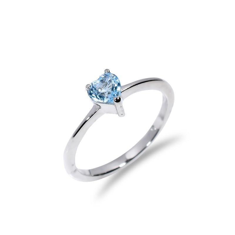 Bague en pierre précieuse classique topaze bleue et taille main