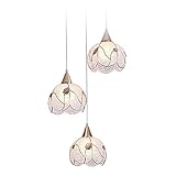 Concepto de diseño: lámpara araña creativa de tres llamas, sencilla y moderna, decorada con iluminación de restaurante, hermosa forma, creando un ambiente cálido y romántico.