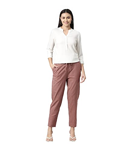 Image of GO COLORS Ikat Print Beige Printed Pencil Pant for Women | Breathable, Side Pocket