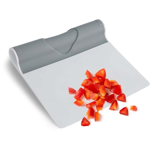 A folding bench scraper that flips open into a wide scoop — genuinely clever design that makes transferring chopped veg fast and clean.