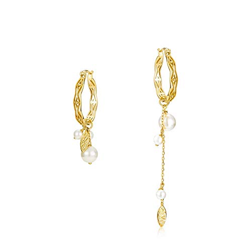 Boucles d'oreilles style d'automne d'hiver asymétriques tendances