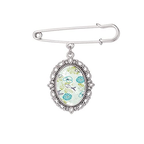 Broche poisson bleu et fleur pour accessoiriser un châle en soirée