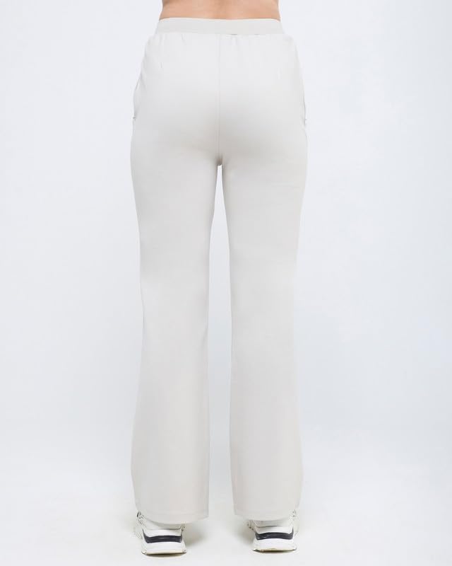 Image of HUNNIT Essential Flare Pants for Women with Zip Pockets | Mid Waist Solid Cotton Tapered Flare Pants | Bootcut Flared Trousers with Wide Elastic Waistband | Relaxed Fit Flared Trouser