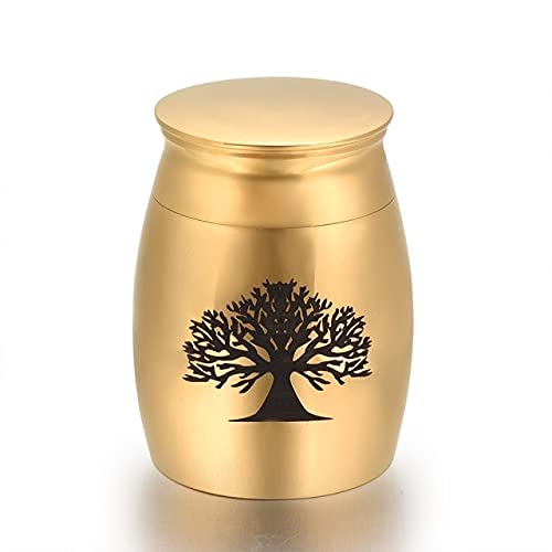 Urne funéraire arbre de vie or 30mm posée sur un autel pour un deuil serein