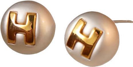 The stud earrings are small and exquisite. You don't need to take them off when sleeping. This is a light luxury pure silver summer earring for women