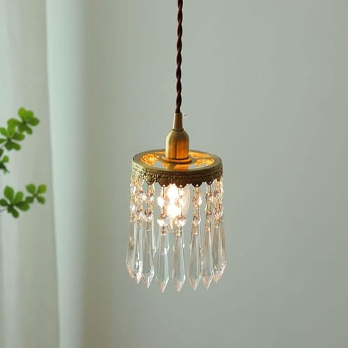Lámpara de cristal dorada regulable para iluminar tu mesa de comedor 3